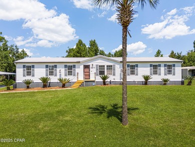 Deer Point Lake Home For Sale in Youngstown Florida