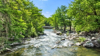 73 feet of Guadalupe River frontage, direct river access, and a - photo 2