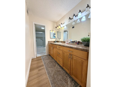 Welcome to this spacious and bright 2/2 corner unit with an - photo 16