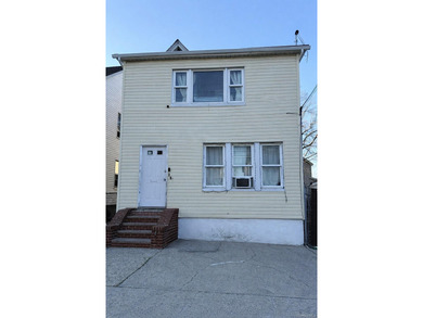 Welcome to a well-maintained two-family home offering - photo 1