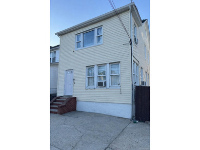 Welcome to a well-maintained two-family home offering - photo 2