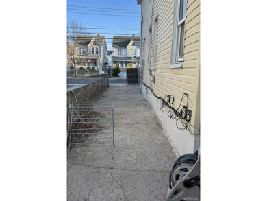 Welcome to a well-maintained two-family home offering - photo 3