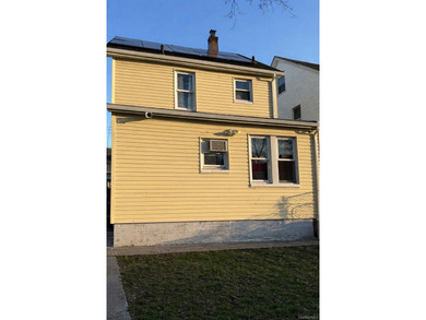 Welcome to a well-maintained two-family home offering - photo 4
