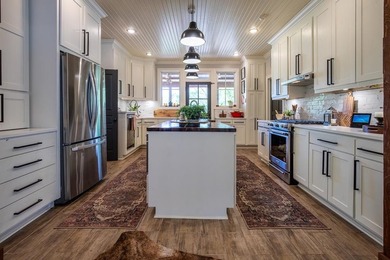This secluded 99.7 acre Property with 4 residences, offers - photo 15