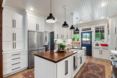 This secluded 99.7 acre Property with 4 residences, offers - photo 16