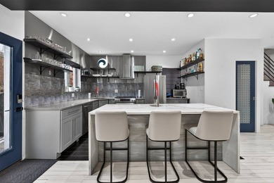 JUST LISTED! DETACHED 5 BEDROOM, 3 BATHROOM HOME IN MORRIS PARK - photo 3