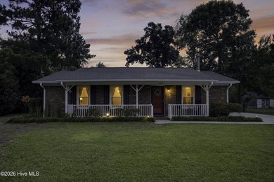 Beautifully updated all-brick home tucked away on a quiet - photo 1