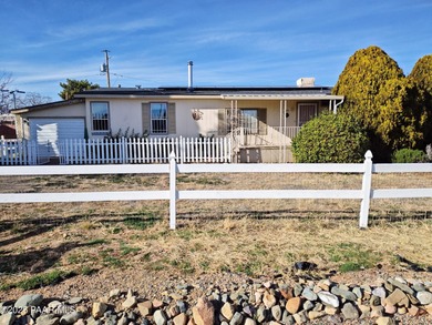 This is a great double wide that has been updated over time: New