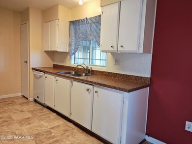 This is a great double wide that has been updated over time: New