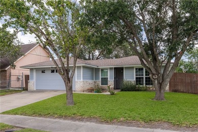 Welcome to this well-maintained one-story brick home located on - photo 2