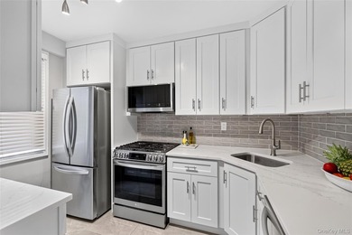 Welcome home to this light-filled, beautifully renovated - photo 13