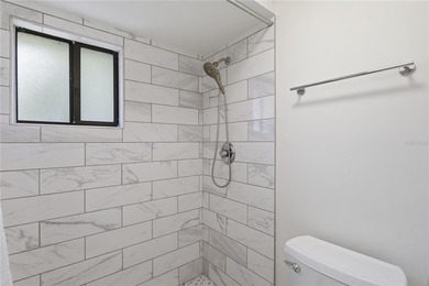 Welcome to this beautifully renovated second-floor condo in the - photo 22