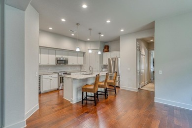 Experience effortless luxury living in the highly sought-after - photo 6