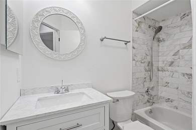 Welcome to this beautifully renovated second-floor condo in the - photo 27
