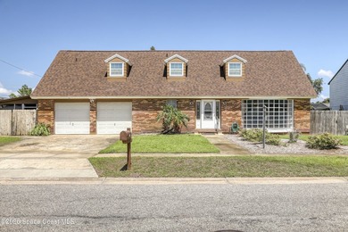 Welcome to this spacious 4-bedroom, 2.5-bath pool home located - photo 1