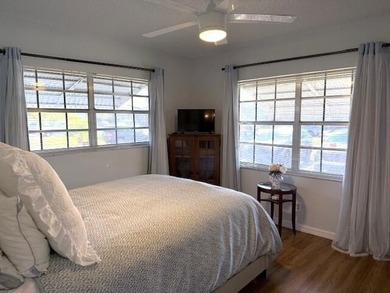CONDO BEAUTIFUL!! This partially furnished end condo is updated - photo 14