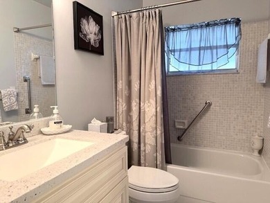 CONDO BEAUTIFUL!! This partially furnished end condo is updated - photo 15