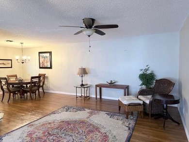 CONDO BEAUTIFUL!! This partially furnished end condo is updated - photo 24
