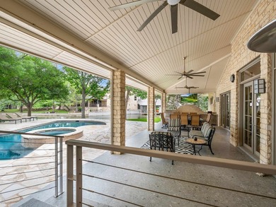 Set along 395 feet of Lake LBJ waterfront in Horseshoe Bay, 115 - photo 23