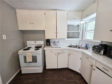 What a gem!!! This beautiful home boasts two LARGE bedrooms and - photo 8