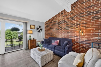 Enjoy Lake Como views from this updated 2nd-floor condo in the - photo 12