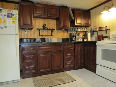 Nestled in the woods this Two bedroom, 1 bath home has a - photo 4
