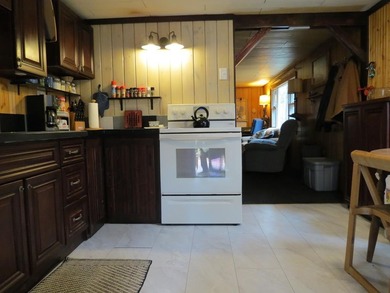 Nestled in the woods this Two bedroom, 1 bath home has a - photo 5