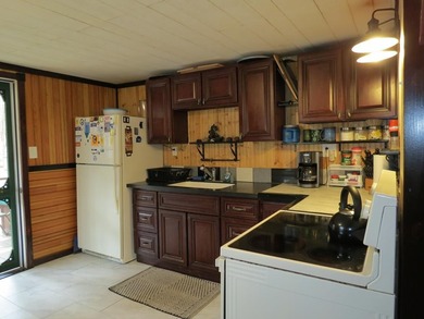 Nestled in the woods this Two bedroom, 1 bath home has a - photo 9