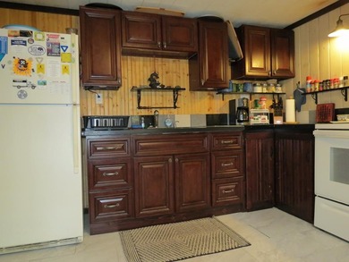 Nestled in the woods this Two bedroom, 1 bath home has a - photo 10