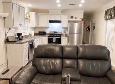 Discover relaxed coastal living in this beautifully maintained - photo 3