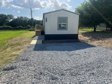 Lake Home For Sale in Pelican Bay, Texas