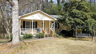 Located in the desirable Lake Wildwood community, this charming - Lake Home For Sale in Macon, Georgia