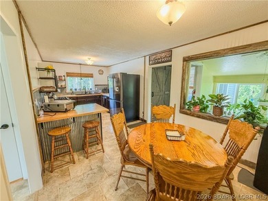 New price on this Lake area retreat on 3 acres with garage/RV - photo 11