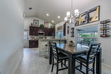 Step into this immaculate, model-like 3BR/2BA home with a den in - photo 12