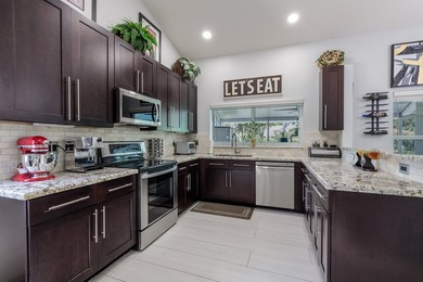 Step into this immaculate, model-like 3BR/2BA home with a den in - photo 13