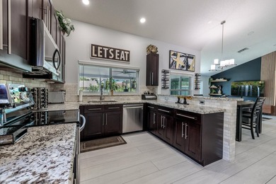 Step into this immaculate, model-like 3BR/2BA home with a den in - photo 14