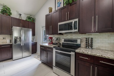 Step into this immaculate, model-like 3BR/2BA home with a den in - photo 15