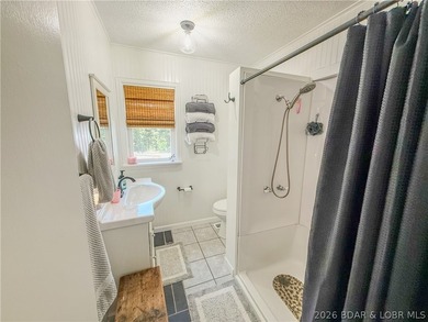 New price on this Lake area retreat on 3 acres with garage/RV - photo 16