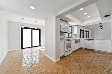 Corner unit villa features 2 bed, 2 bath, large den (could be a - photo 16