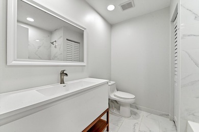 Corner unit villa features 2 bed, 2 bath, large den (could be a - photo 21