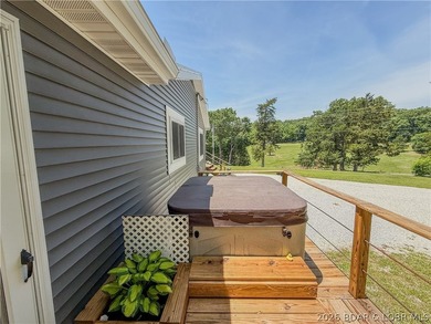 New price on this Lake area retreat on 3 acres with garage/RV - photo 26