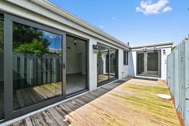 Corner unit villa features 2 bed, 2 bath, large den (could be a - photo 32