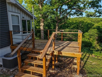 New price on this Lake area retreat on 3 acres with garage/RV - photo 41