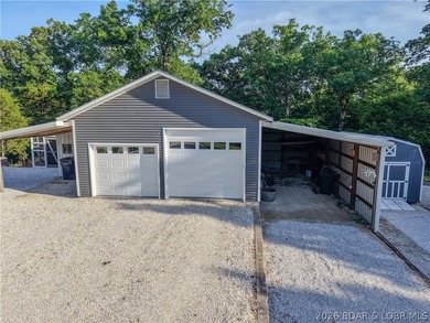New price on this Lake area retreat on 3 acres with garage/RV - photo 49