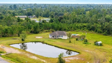 Lake Home For Sale in Youngstown, Florida