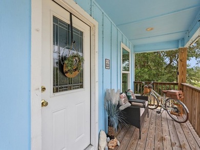 Built in 2021, this 3-bedroom, 2-bath coastal cottage sits on - photo 2