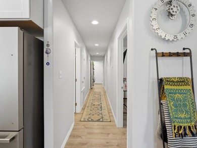 Built in 2021, this 3-bedroom, 2-bath coastal cottage sits on - photo 10