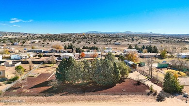 Set on a beautifully landscaped 0.8-acre lot in Paulden, AZ