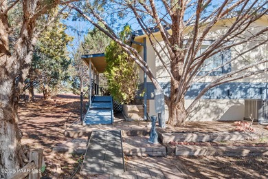 Set on a beautifully landscaped 0.8-acre lot in Paulden, AZ