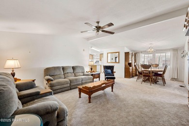 Set on a beautifully landscaped 0.8-acre lot in Paulden, AZ